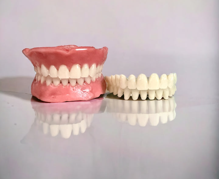 Artificial teeth beside denture A1/24 small 